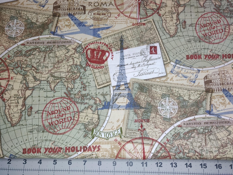 May include: A fabric with a vintage travel theme, featuring world maps, compasses, and postcards. The design includes text such as "Around the World" and "Book Your Holidays" in red and green. The color palette is primarily beige, green, and brown.