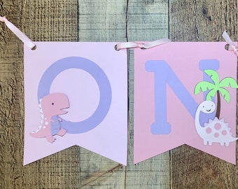 Banner de trona de dinosaurios: rosas y morados