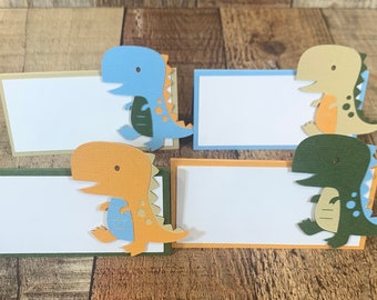 Tarjetas de mesa de dinosaurios: oliva, azul, mandarina y tostado