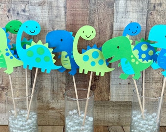 Centros de mesa con dinosaurios: azul, aguamarina, lima y verde