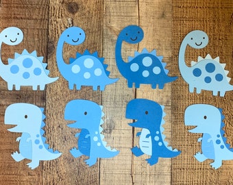 Troqueles de papel de dinosaurio en tonos azules