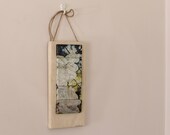 Abstract photo mounted on suede covered wood