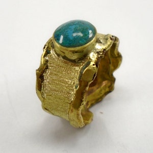 Forged brass ring band with melted edges, malachite and persolalized text.