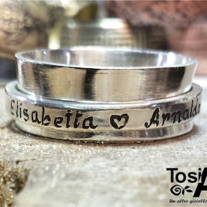 With personalized text. Sterling silver ring with spinner anxiety ring.