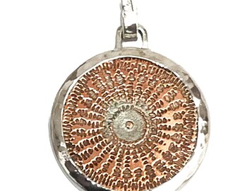 Silver pendant with copper engraved Chladni figure representing 432 Hz.