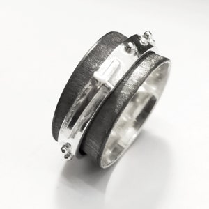 Anello rosario filatore in argento, spinner versione annerita, forgiato e saldato a mano, con scritta interna.