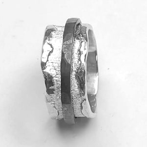 Personalized text sterling silver spinner ring, with blackened rotating ring, anxiety ring, melted and hammered forged edge.