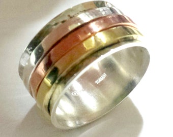 925 silver ring with 3 spinner rings of copper, silver and brass; with personalized text.