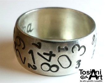 Personalized text ring, with random numbers engraved.