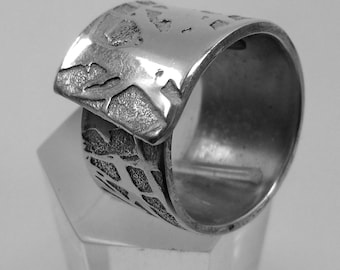 Open aluminum ring, artistically etched, with personalized text.