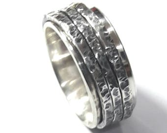 With personalized text, stering silver ring with 3 spinner rings of hammered silver.