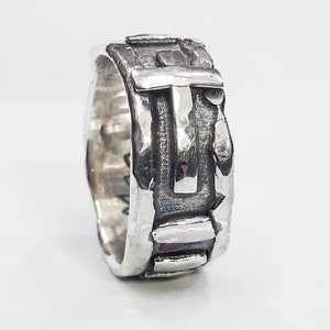 Handmade silver blackened rosary ring with a cross and personalized text.