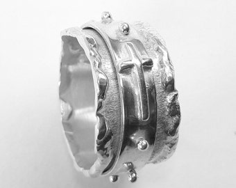 From our design, forged, elegant and humble silver rotating rosary ring, with personalized text.