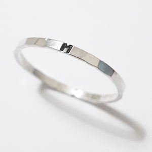 Sterling silver minimalist ring, with a 1,5 MM stamped letter or initial.