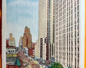 6th Avenue, Rockefeller Center and Radio City Music Hall- New York City- Vintage NY Linen Postcard