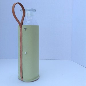 modern glass water bottle with handmade leather wrap will motivate you to drink more water image 1
