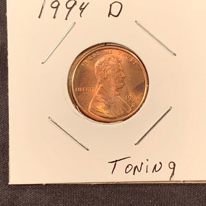 1994 D Lincoln Memorial Uncirculated Cent Color Toning Copper Orange US Penny Zinc image 1