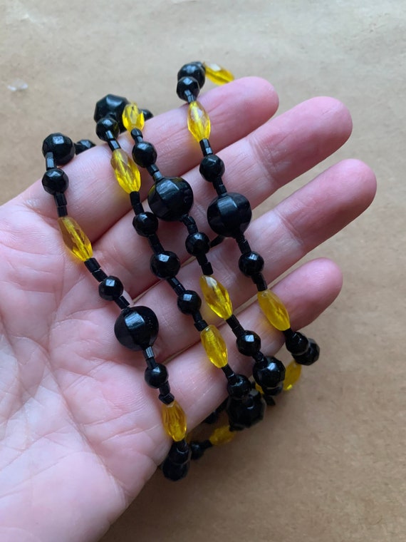 Beautiful Black And Yellow Faceted Glass Beaded Ne