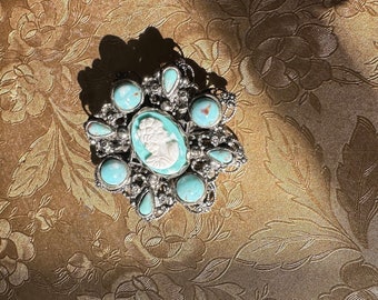 Gorgeous Vintage Silver Tone Metal Filigree Brooch With Turquoise Colored Cabochons And White Cameo