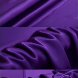 Puede incluir: Un primer plano de una tela de satén de color morado oscuro. La tela es suave y sedosa, con un brillo suave. La tela está doblada de una manera que muestra su textura y caída.