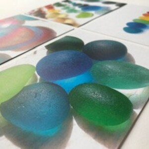 Lot de 4 cartes postales en forme de verre de mer