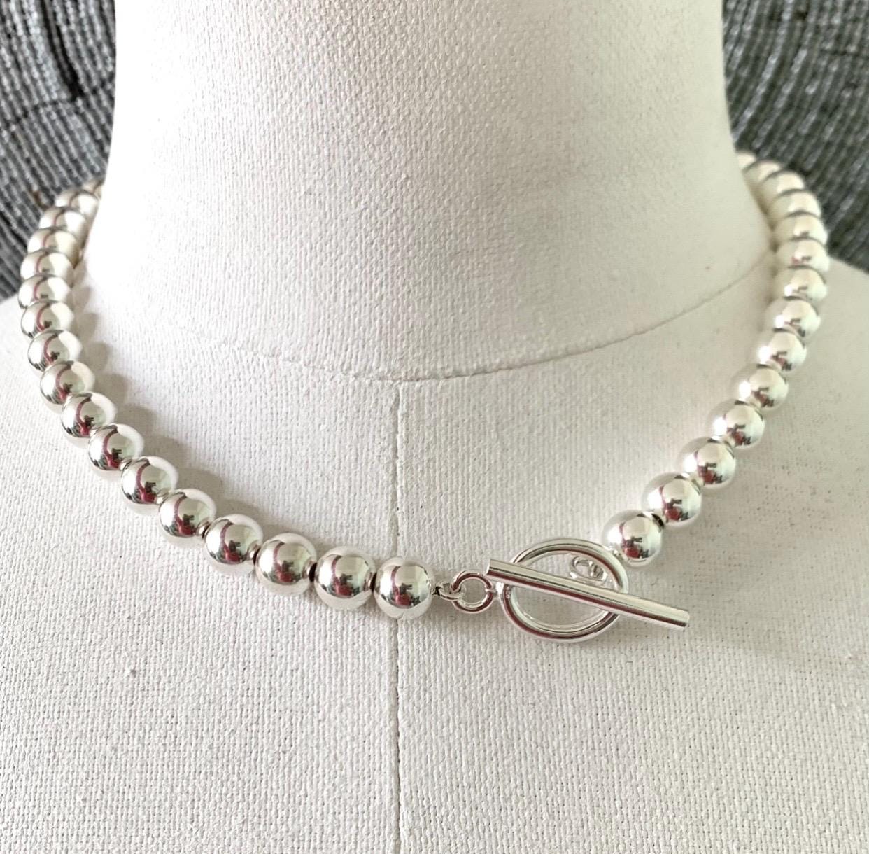 Silver 8mm heavier ball necklace, good quality sterling silver balls hand strung on strong chain with a solid sterling silver toggle clasp,