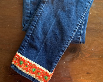 Hand Sewn Altered Jeans With Orange Flowers Embroidered Border On Bottom Hem