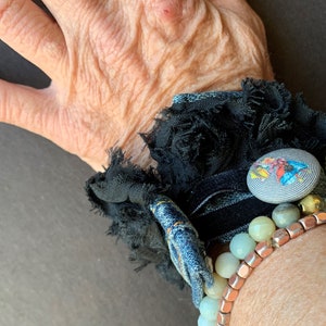 Denim Boho Cuff Bracelet with Alice in Wonderland Button and BLack Ribbon