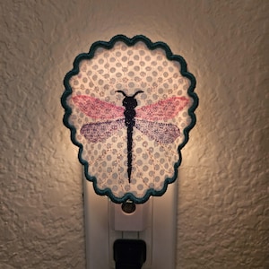 May include: A rustic wooden sign with the text "Welcome to our home" in white lettering. The sign features a distressed finish and a simple, inviting design, perfect for a front porch or entryway.