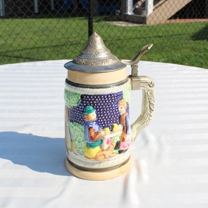 Pottery Beer Stein with 3D Embosses Couple and Lid -  Castle Beer Stein - Short / Small Stein
