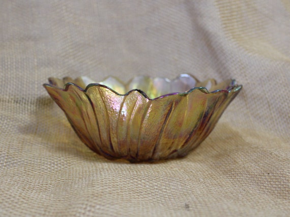 Gold Iridescent Carnival Glass Bowl in a Flower Pattern