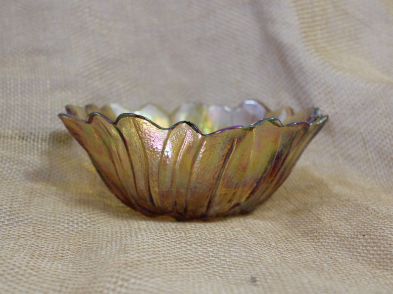 Gold Iridescent Carnival Glass Bowl in a Flower Pattern image 1