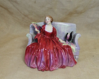 Royal Doulton &quot;Sweet & Twenty&quot;  Figurine H1299 - 1922 Royal Doulton Figurine of Lady on Couch / Sofa