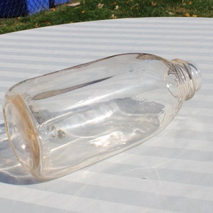 Silvas Farms Inc. Clear Glass Quart Milk Bottle