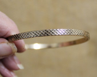 Gold Tone Metal Bangle Bracelet with Diamond or Criss Cross Pattern