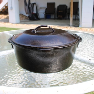 Cast Iron Dutch Oven with Handle and Self Basting Spikes in the lid