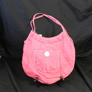 Bolso de mano bohemio de algodón en color rosa y salmón de LuLu nyc