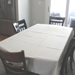 White Tablecloth with Stripe Detail - Elegant Dining Table Cover