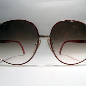 1980s Christian Dior 2250 vintage sunglasses red metal Optyl lady modernist shades american hustle NOS case Austria