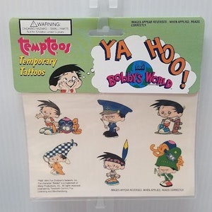 May include: A sheet of temporary tattoos featuring characters from the cartoon show "Bobby's World". The sheet is green and white with the show's logo and the words "Ya Hoo!" in a speech bubble. The tattoos feature Bobby in various outfits, including a police officer, a Native American, and a pirate.