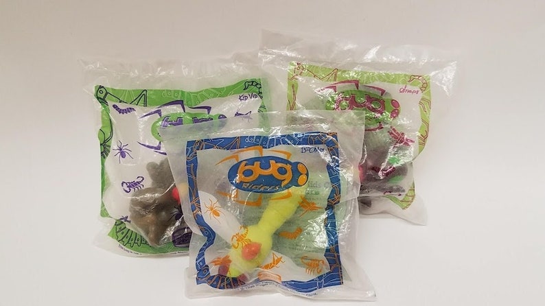 Lot Of 3 Unopened Burger King Kids Club Bug Riders Toys 1998 image 1