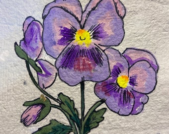 Watercolor pansy painting on handmade paper