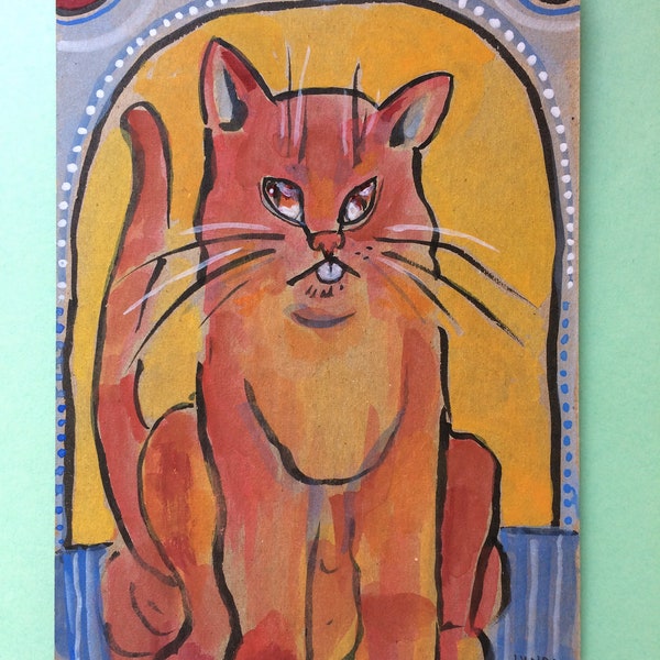 Orange Kitty on Blue Striped Rug