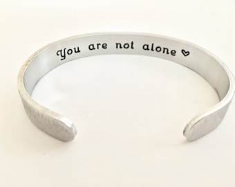 You are not alone. survivor bracelet. Positive affirmation Cuff, Jewelry Bracelet, Cancer Survivor Bracelet, Daily Affirmation Jewelry, Cuff