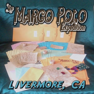 May include: The Marco Polo Expedition game set. The image shows a collection of aged paper documents, envelopes, and small decorative items. The text "Marco Polo Expedition" is displayed in a stylized font, with "Livermore, CA" below.