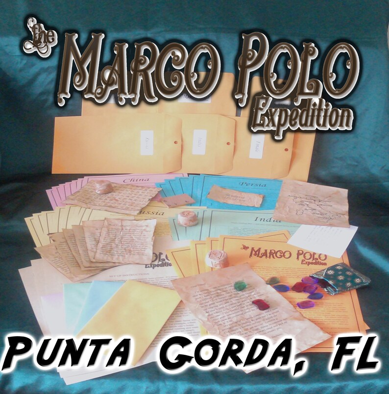 May include: A collection of papers, envelopes, and small objects with the text "The Marco Polo Expedition" and "Punta Gorda, FL". The items are arranged on a teal surface, with various colors and textures.