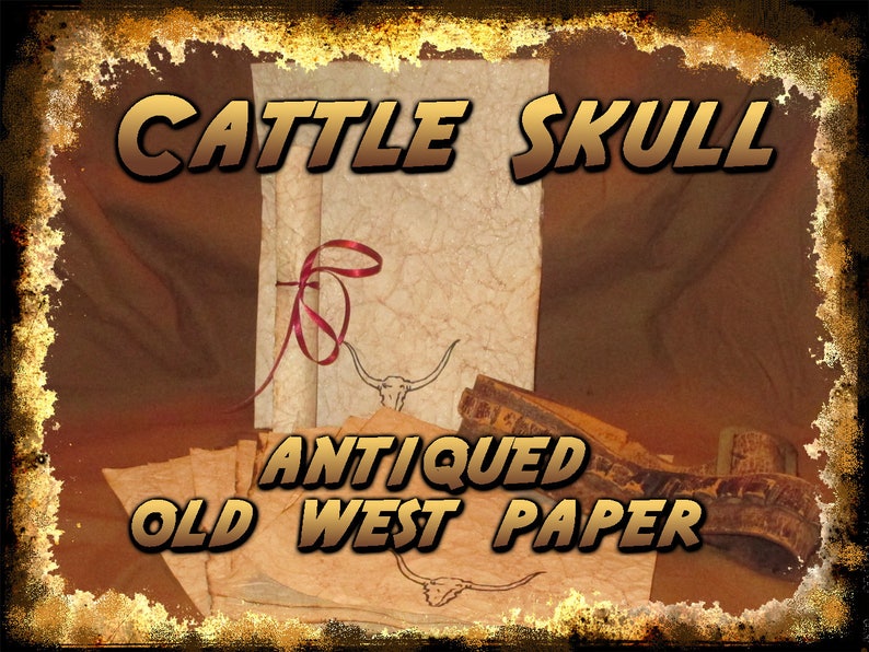 May include: Antique Old West paper with the words "Cattle Skull" and "Antiqued Old West Paper" in gold lettering. The paper is a light brown color with a textured appearance. A red ribbon is tied around a stack of paper, and a drawing of a longhorn is visible.