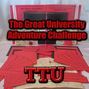 May include: A collection of red and black paper items, including cards, maps, and documents, arranged on a white surface. The text "The Great University Adventure Challenge" is prominently displayed. The letters "TTU" are also visible.
