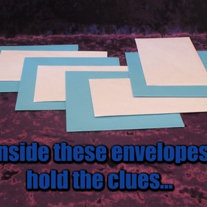 May include: Several light blue and white envelopes are arranged on a purple surface. The text "Inside these envelopes hold the clues..." is displayed in blue and white.