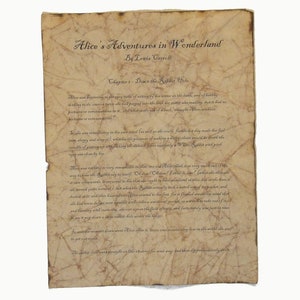 May include: A vintage-style page from "Alice's Adventures in Wonderland" by Lewis Carroll. The text is printed in black ink on aged, yellowed paper, with the title and chapter heading at the top. The page has a slightly crumpled appearance.